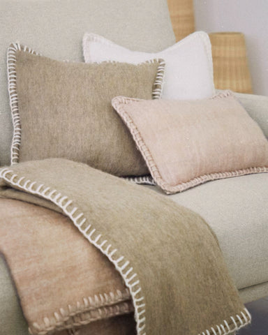 Blanket stitch throws in blush & natural