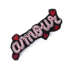 Embroidered patch as a brooch